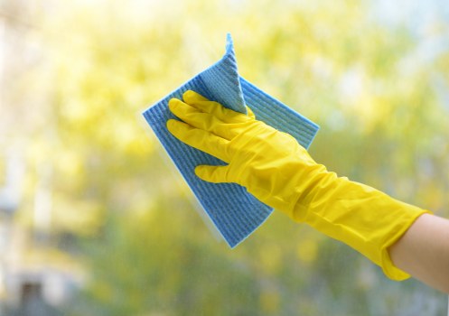 Detailed post construction cleaning on windows and surfaces